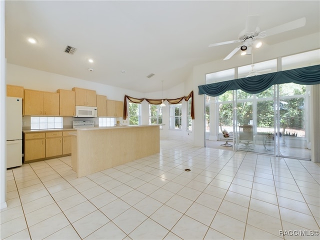 kitchen with ceiling fan, light brown cabinetry, light tile patterned floors, and white appliances