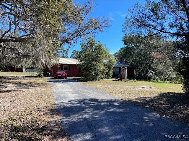 view of road featuring driveway