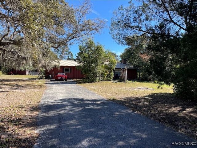 view of road with aphalt driveway