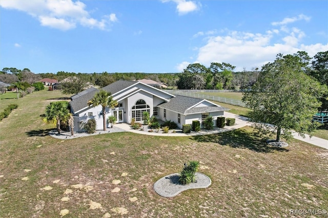 view of front of home featuring a front lawn