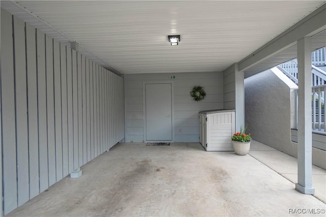 entrance to property with a carport