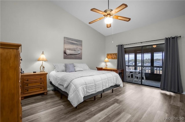 bedroom with ceiling fan, access to exterior, hardwood / wood-style floors, and high vaulted ceiling