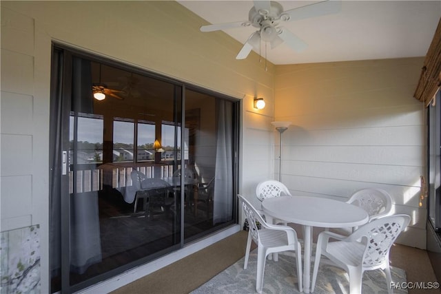 balcony featuring ceiling fan