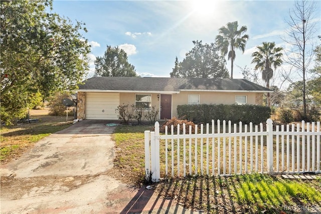 ranch-style home with a garage