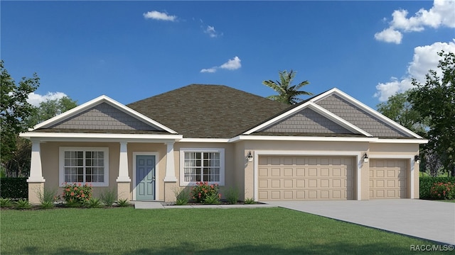 view of front of property featuring a front yard and a garage