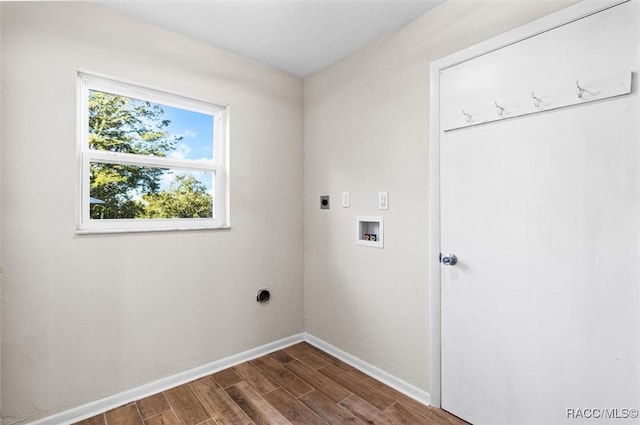 laundry room with hookup for an electric dryer, hookup for a washing machine, and dark hardwood / wood-style floors