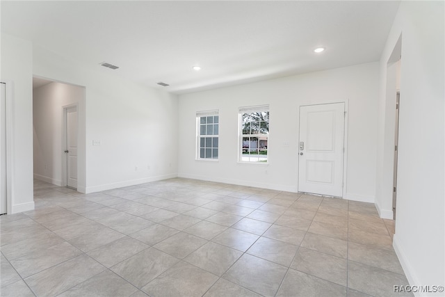 view of tiled spare room