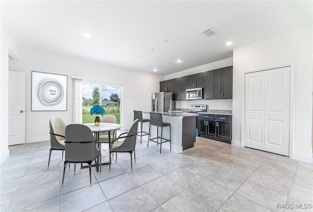 dining room featuring light tile patterned floors