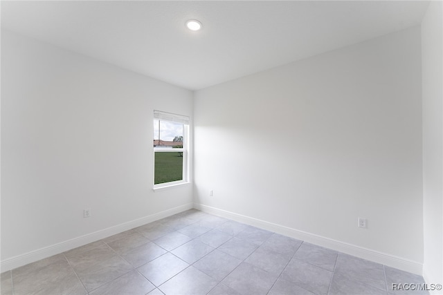 view of tiled spare room