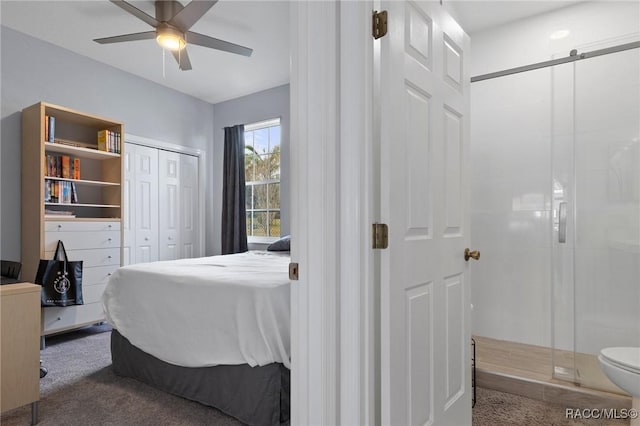 bedroom with a closet, dark carpet, and ceiling fan