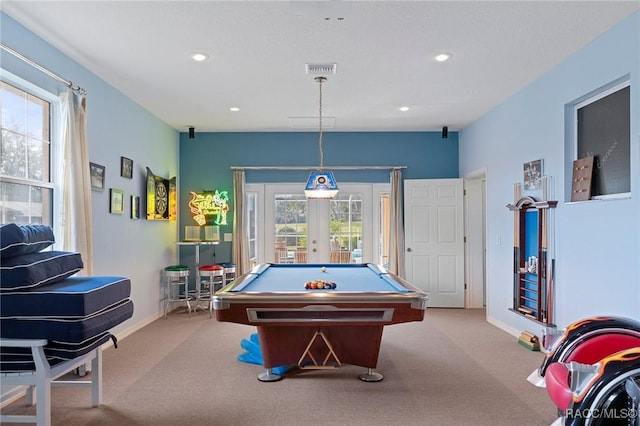 recreation room featuring light carpet, plenty of natural light, billiards, and french doors