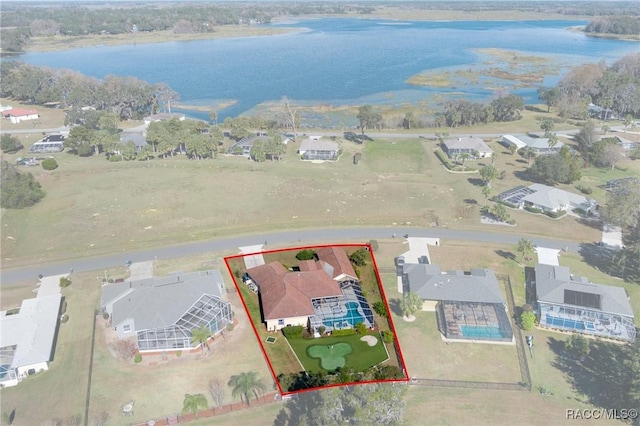 aerial view featuring a water view and a residential view