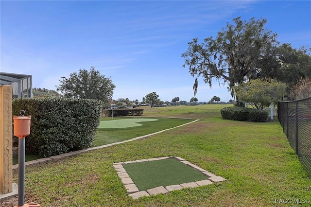 view of yard with fence