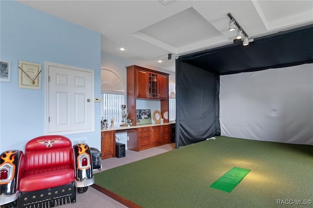 recreation room with light carpet, golf simulator, track lighting, and recessed lighting