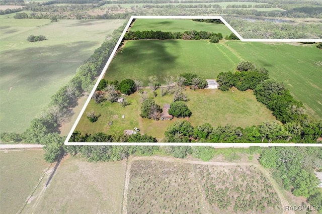 drone / aerial view featuring a rural view and a water view