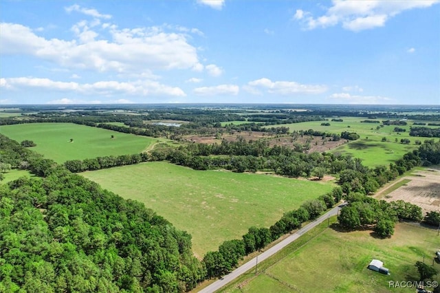 birds eye view of property featuring a rural view