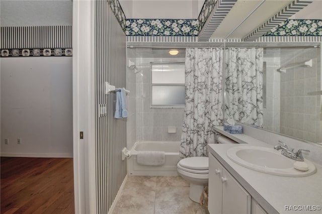 full bathroom with hardwood / wood-style floors, vanity, shower / bath combination with curtain, and toilet