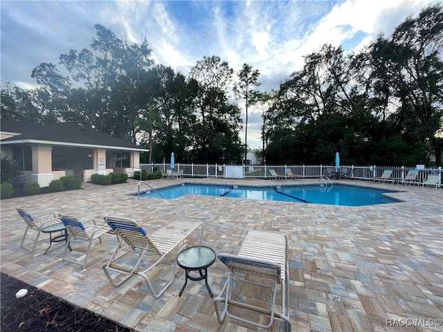 view of pool with a patio