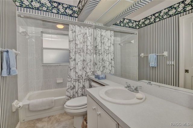 full bathroom with vanity, toilet, and shower / bathtub combination with curtain