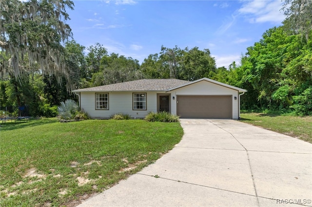 ranch-style house with a garage and a front yard