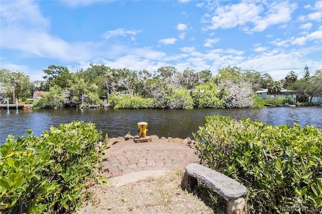 view of water feature featuring an outdoor fire pit