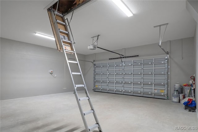 garage featuring a garage door opener