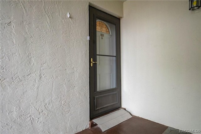 2400 Forest Dr Unit 103, Inverness, FL 34453 - entrance to property with stucco siding