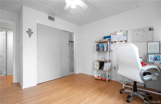 office area featuring ceiling fan and hardwood / wood-style floors