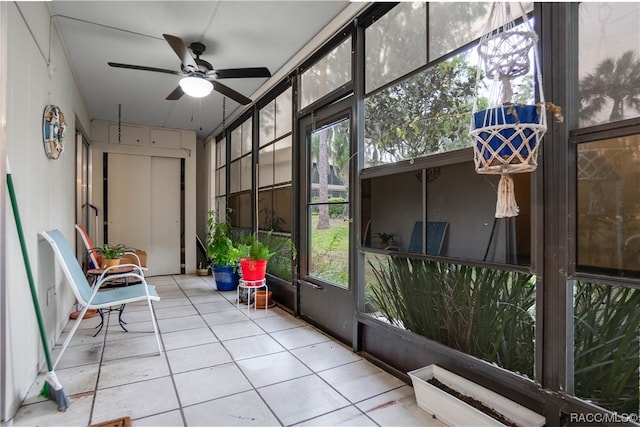 sunroom with ceiling fan and a wealth of natural light