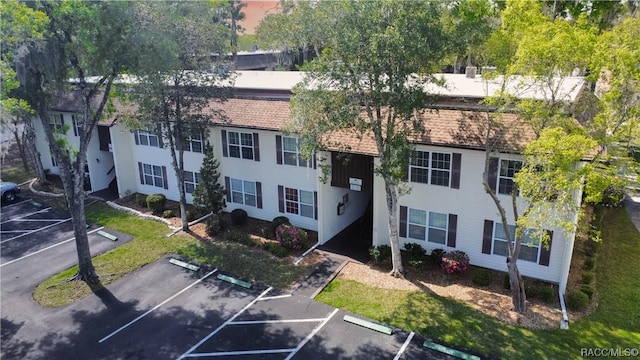 2400 Forest Dr Unit 103, Inverness, FL 34453 - view of building exterior with uncovered parking