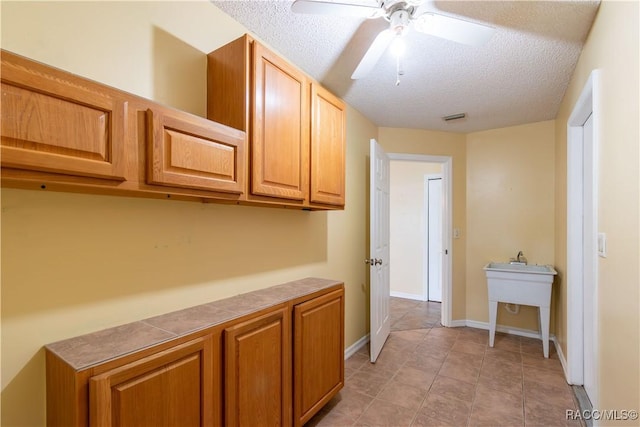 3231 S Eagle Pt, Inverness, FL 34450 - corridor featuring a textured ceiling