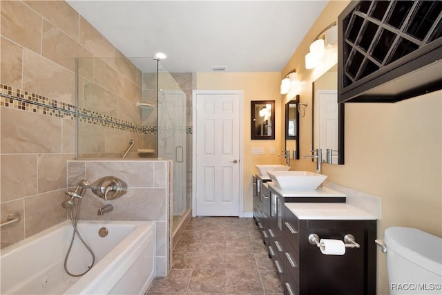 3231 S Eagle Pt, Inverness, FL 34450 - bathroom with a jetted tub, double vanity, and a shower stall