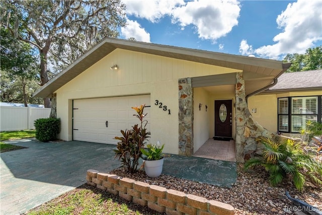 3231 S Eagle Pt, Inverness, FL 34450 - single story home featuring an attached garage and driveway