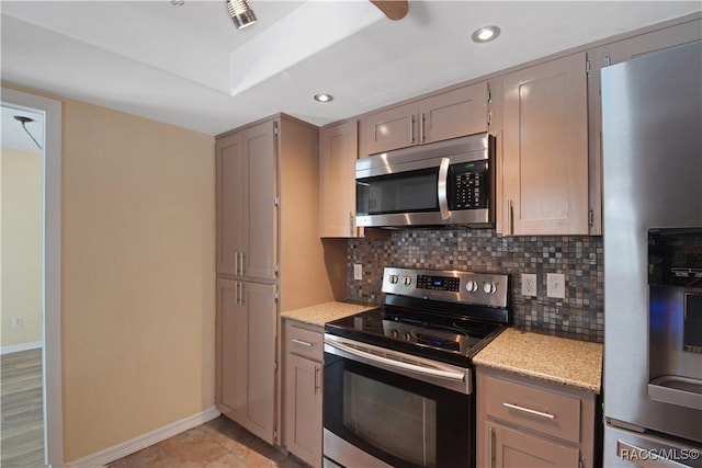 3231 S Eagle Pt, Inverness, FL 34450 - kitchen featuring appliances with stainless steel finishes, backsplash, recessed lighting, and gray cabinets