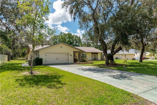 3231 S Eagle Pt, Inverness, FL 34450 - single story home with an attached garage, concrete driveway, and stucco siding