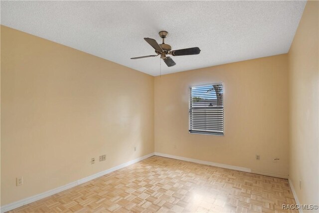 3231 S Eagle Pt, Inverness, FL 34450 - spare room featuring a textured ceiling and a ceiling fan