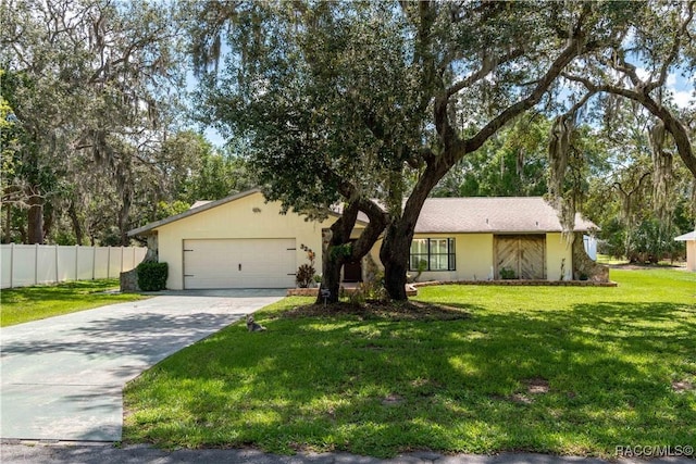 3231 S Eagle Pt, Inverness, FL 34450 - view of front of home with an attached garage and driveway