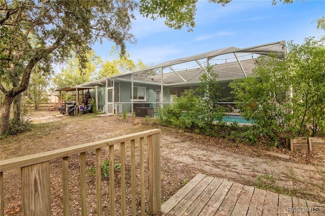 wooden deck with a lanai