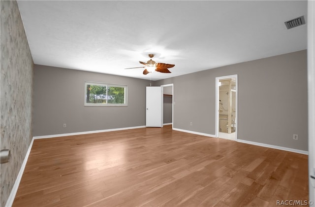 unfurnished room featuring wood-type flooring