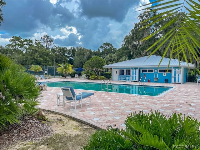 view of pool with a patio area