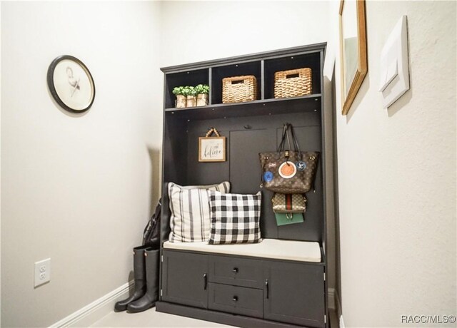 mudroom featuring baseboards