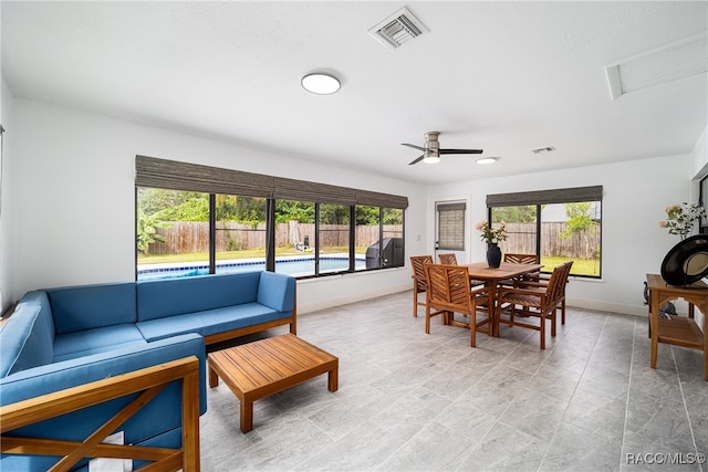 living room with ceiling fan