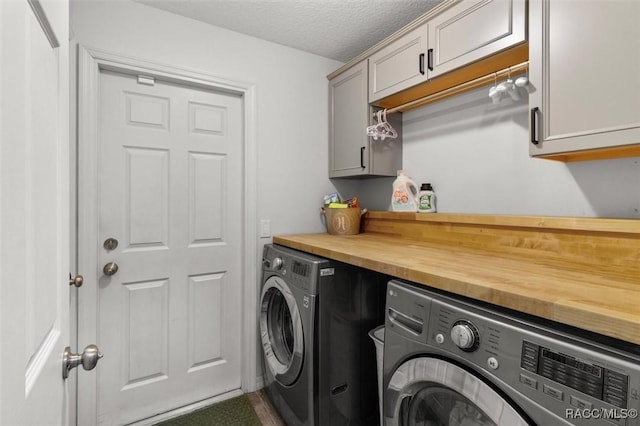 5317 W Tortuga Loop, Lecanto, FL 34461 - washroom with independent washer and dryer, cabinet space, a bar, and a textured ceiling