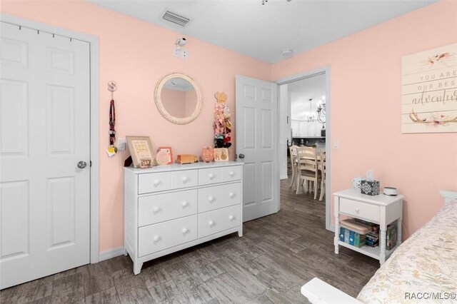 5317 W Tortuga Loop, Lecanto, FL 34461 - bedroom with wood finished floors and baseboards