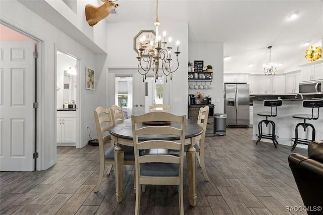 5317 W Tortuga Loop, Lecanto, FL 34461 - dining room with a chandelier and dark wood-style floors