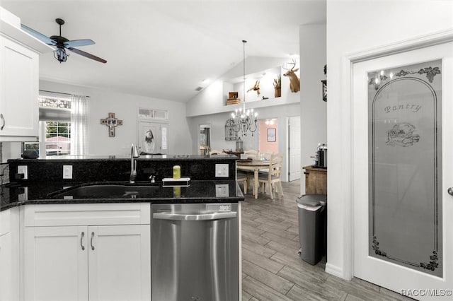 5317 W Tortuga Loop, Lecanto, FL 34461 - kitchen featuring dishwasher, a ceiling fan, lofted ceiling, a chandelier, and white cabinetry