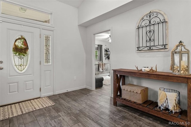 5317 W Tortuga Loop, Lecanto, FL 34461 - foyer entrance featuring dark wood-style flooring and baseboards