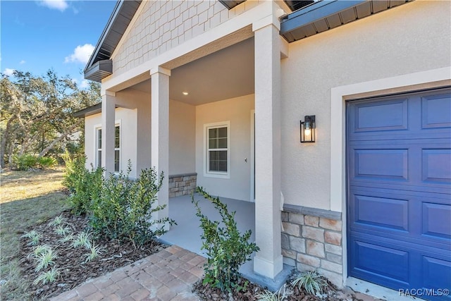 property entrance with a garage