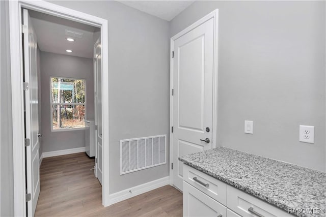 interior space with light hardwood / wood-style floors