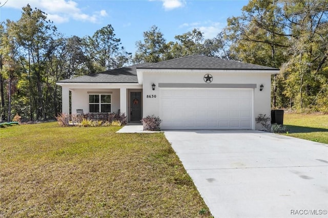 ranch-style house featuring a garage, a front yard, and covered porch